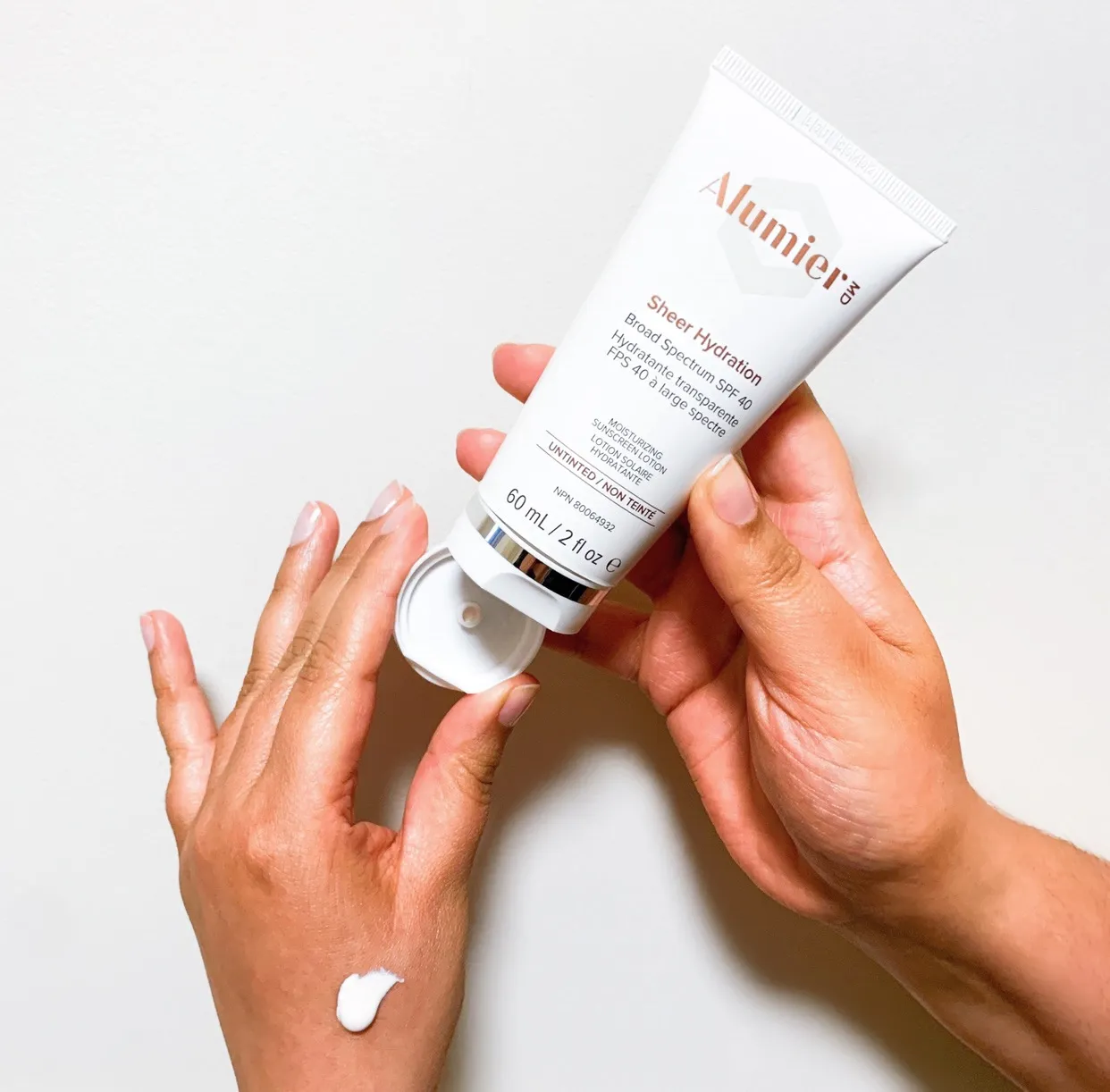 AlumierMD Sheer Hydration SPF 40 in hand