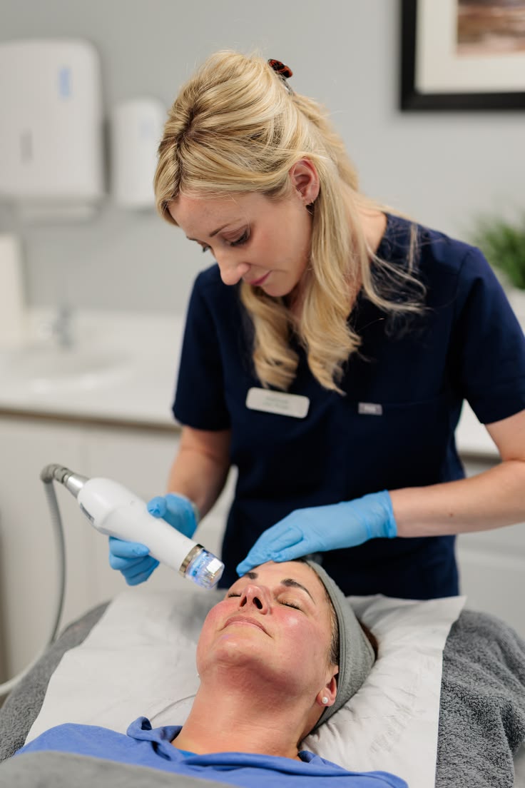 RF microneedling treatment on a client's forehead at EliteMD Aesthetics in Markham